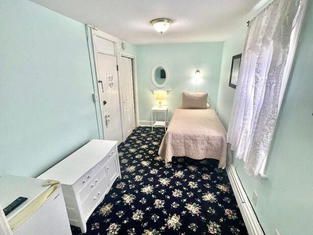 Imagen de la habitación del Hotel Quaker Inn. Foto 15