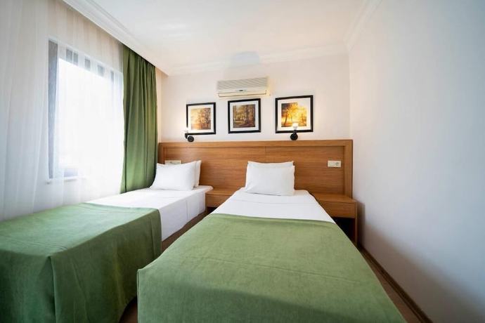 Imagen de la habitación del Hotel Qualia Park Hotel. Foto 12