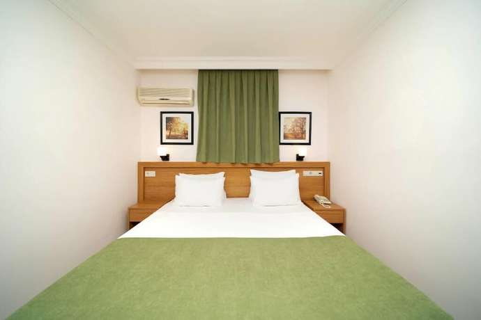 Imagen de la habitación del Hotel Qualia Park Hotel. Foto 15