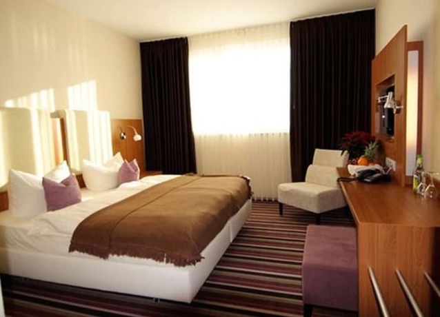 Imagen de la habitación del Hotel Qualitel Hilpoltstein. Foto 7