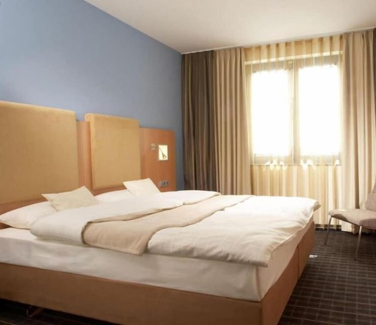 Imagen de la habitación del Hotel Qualitel Wilnsdorf. Foto 4