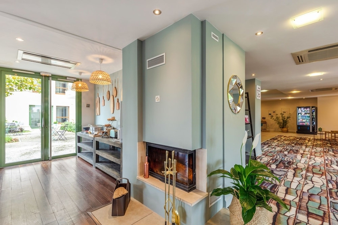 Imagen del bar/restaurante del Hotel Quality Aparthotel Divonne - Portes de Geneve. Foto 2