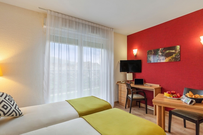 Imagen de la habitación del Hotel Quality Aparthotel Divonne - Portes de Geneve. Foto 10