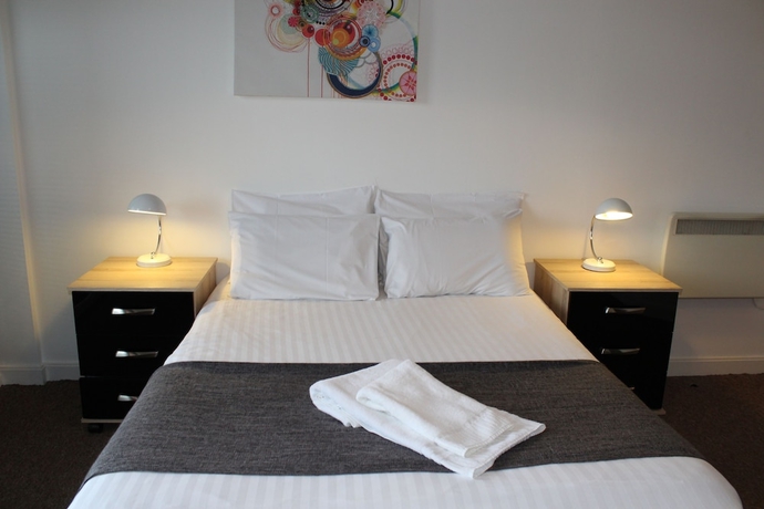 Imagen de la habitación del Hotel Quality City Apartments. Foto 2