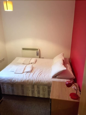 Imagen de la habitación del Hotel Quality City Apartments. Foto 10