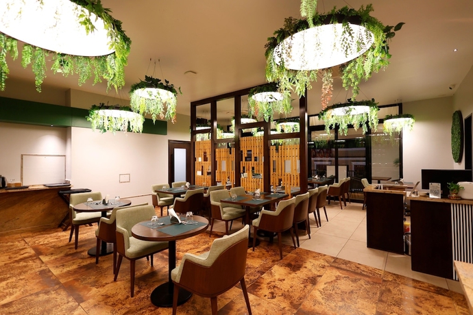 Imagen del bar/restaurante del Hotel Quality Inn City Centre Varanasi. Foto 4