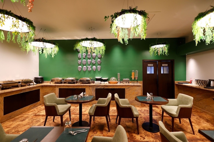 Imagen del bar/restaurante del Hotel Quality Inn City Centre Varanasi. Foto 5