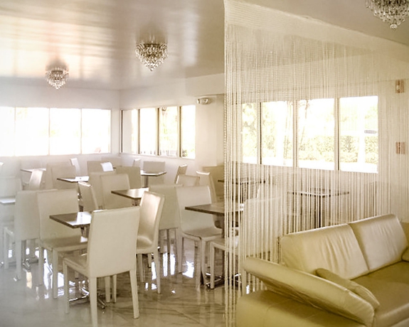 Imagen del bar/restaurante del Hotel Quality Inn Clermont West Kissimmee. Foto 2