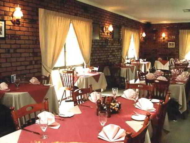 Imagen del bar/restaurante del Hotel Quality Inn Overlander Homestead. Foto 9