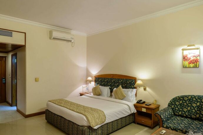 Imagen de la habitación del Hotel Quality Inn Palms. Foto 26