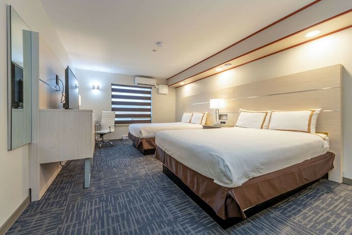Imagen de la habitación del Hotel Quality Inn Sunshine Suites. Foto 20