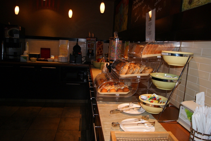 Imagen del bar/restaurante del Hotel Quality Inn and Suites P.e. Trudeau Airport. Foto 6