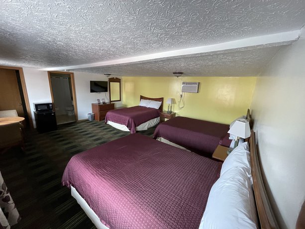 Imagen de la habitación del Hotel Quality Lodge. Foto 3