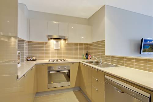 Imagen de la habitación del Hotel Quality Suites Pioneer Sands. Foto 4
