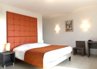 Imagen de la habitación del Hotel Quality Suites Pontoise Les Impressionnistes. Foto 7