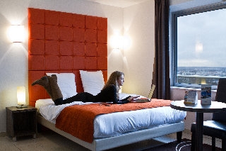 Imagen de la habitación del Hotel Quality Suites Pontoise Les Impressionnistes. Foto 8