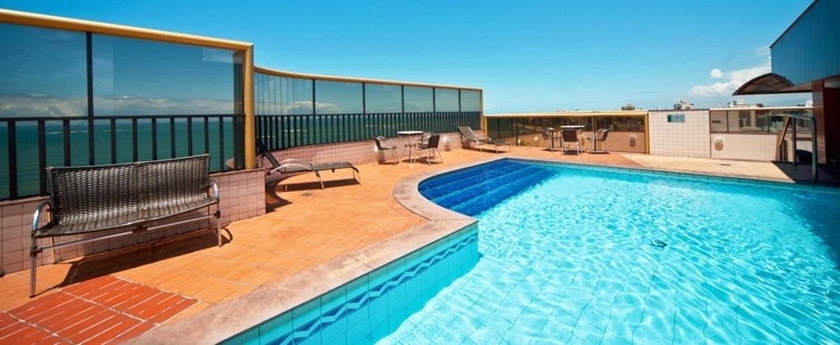 Imagen de la piscina del Hotel Quality Suites Vila Velha. Foto 9