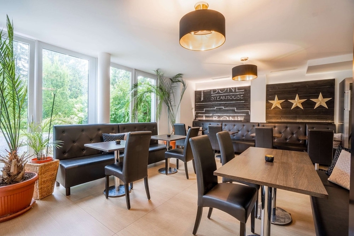 Imagen de los interiores del Hotel Quality and Suites Muenchen Messe. Foto 17