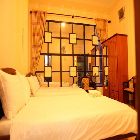 Imagen de la habitación del Hotel Quang Chien. Foto 17