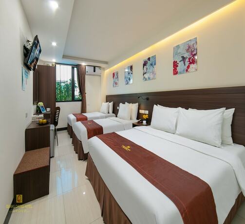 Imagen de la habitación del Hotel Quang Chung. Foto 13