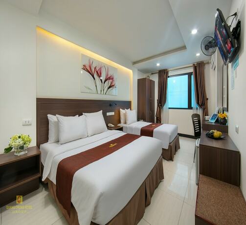 Imagen de la habitación del Hotel Quang Chung. Foto 17