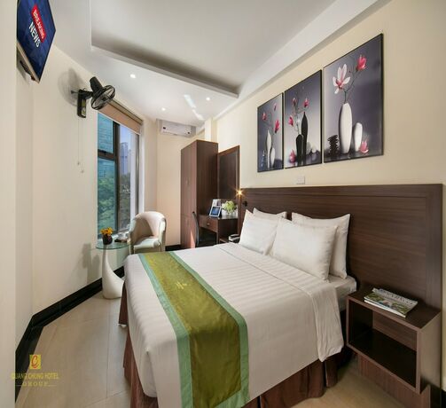 Imagen de la habitación del Hotel Quang Chung. Foto 19