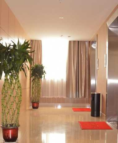 Imagen de los interiores del Hotel Quanrui Business. Foto 10