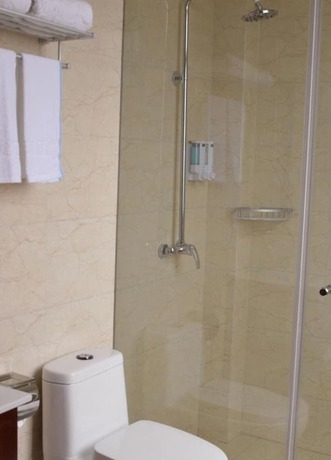 Imagen de la habitación del Hotel Quanrui Business. Foto 3