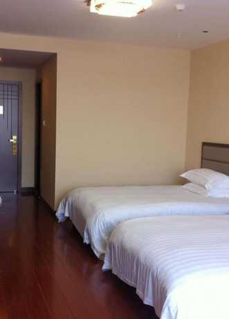 Imagen de la habitación del Hotel Quanrui Business. Foto 9
