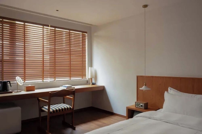 Imagen de la habitación del Hotel Quanzhou Wuji Homestay. Foto 8