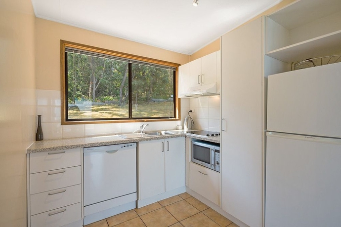 Imagen de la habitación del Hotel Quarantine Bay Beach Cottages. Foto 10