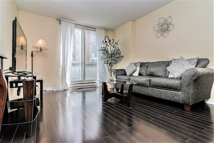 Imagen de la habitación del Hotel Quartier des Spectacles Appartments. Foto 15