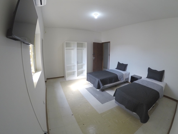 Imagen de la habitación del Hotel Quartos Delfim Moreira. Foto 11