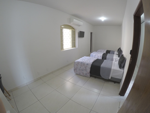 Imagen de la habitación del Hotel Quartos Delfim Moreira. Foto 13