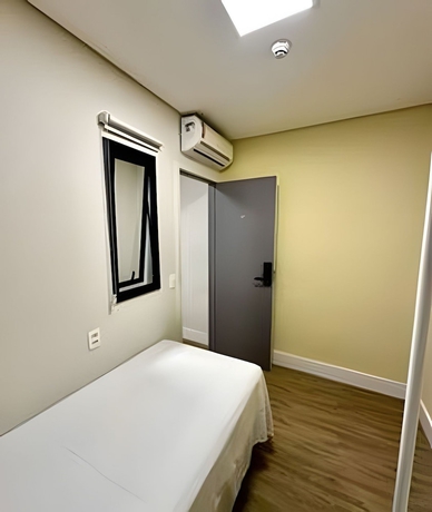 Imagen de la habitación del Hotel Quartos Vila Olimpia. Foto 10