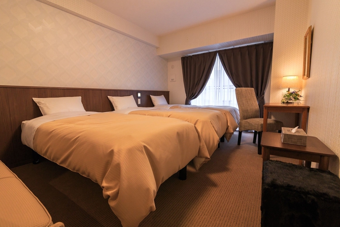 Imagen de la habitación del Hotel Quartz Shin-osaka. Foto 12