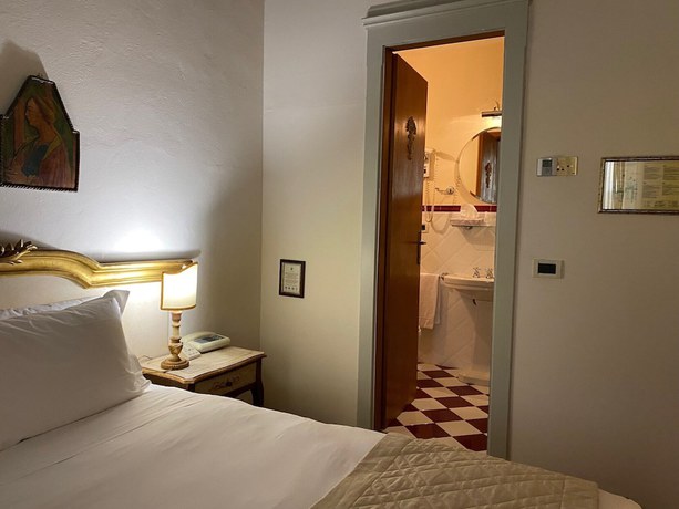 Imagen de la habitación del Hotel Quattro Gigli Palace. Foto 4