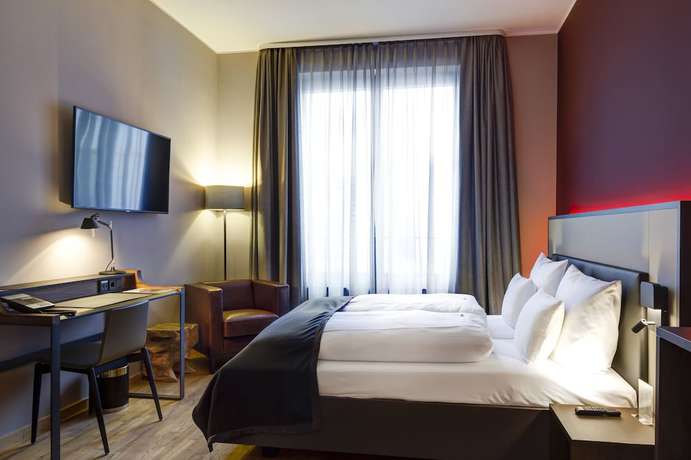 Imagen de la habitación del Hotel Qube Bahnstadt. Foto 11