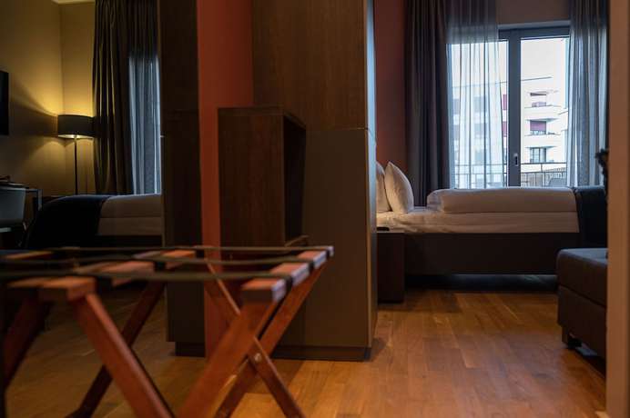 Imagen de la habitación del Hotel Qube Bahnstadt. Foto 15