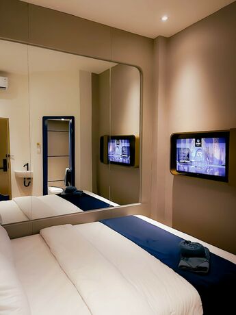 Imagen de la habitación del Hotel Qube By 98hospitality. Foto 10