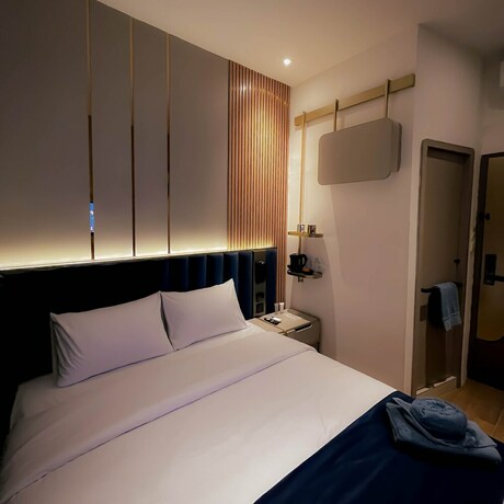 Imagen de la habitación del Hotel Qube By 98hospitality. Foto 20