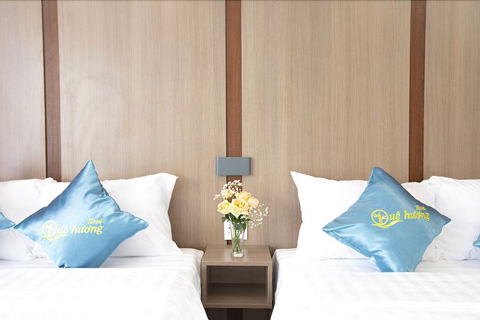 Imagen de la habitación del Hotel Que Huong. Foto 4
