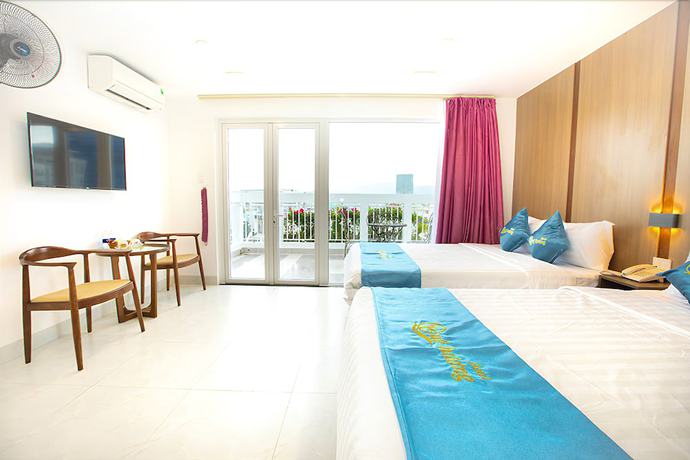 Imagen de la habitación del Hotel Que Huong. Foto 5