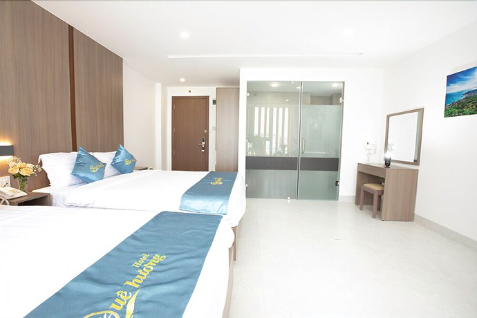 Imagen de la habitación del Hotel Que Huong. Foto 9