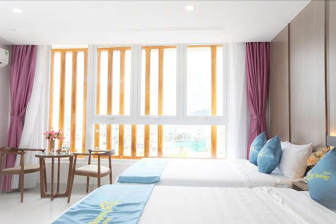 Imagen de la habitación del Hotel Que Huong. Foto 13