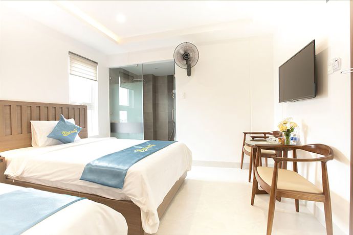 Imagen de la habitación del Hotel Que Huong. Foto 14