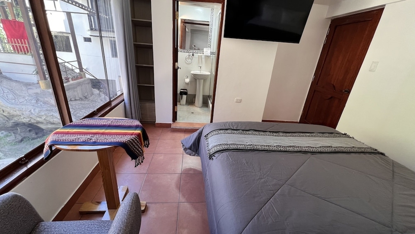 Imagen de la habitación del Hotel Quechuas House hostal and coffee. Foto 3