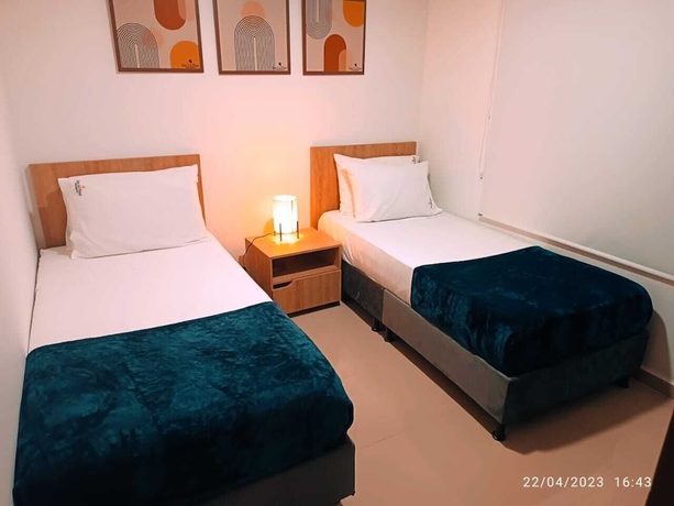 Imagen de la habitación del Hotel Quedate Apartahotel San Gil Plaza. Foto 2
