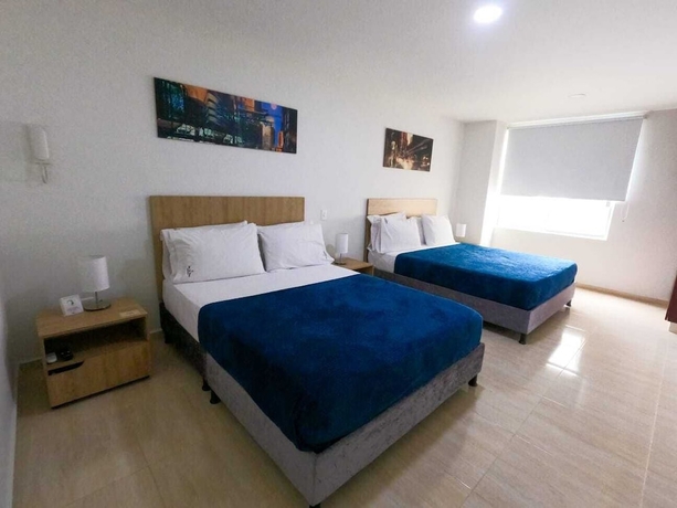 Imagen de la habitación del Hotel Quedate Apartahotel San Gil Plaza. Foto 3