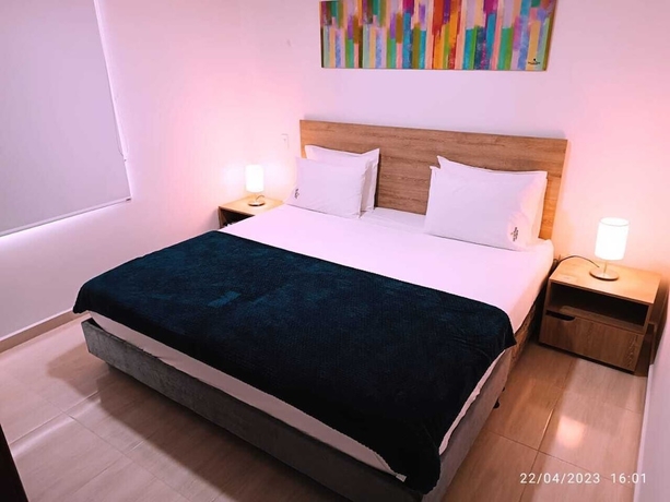 Imagen de la habitación del Hotel Quedate Apartahotel San Gil Plaza. Foto 5